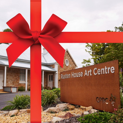 Rusten House wrapped up in a Christmas bow