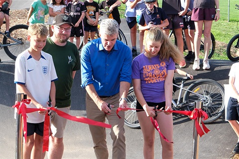 Two children cutting the red ribbon with Local Member Steve Whan and Mayor Kenrick Winchester